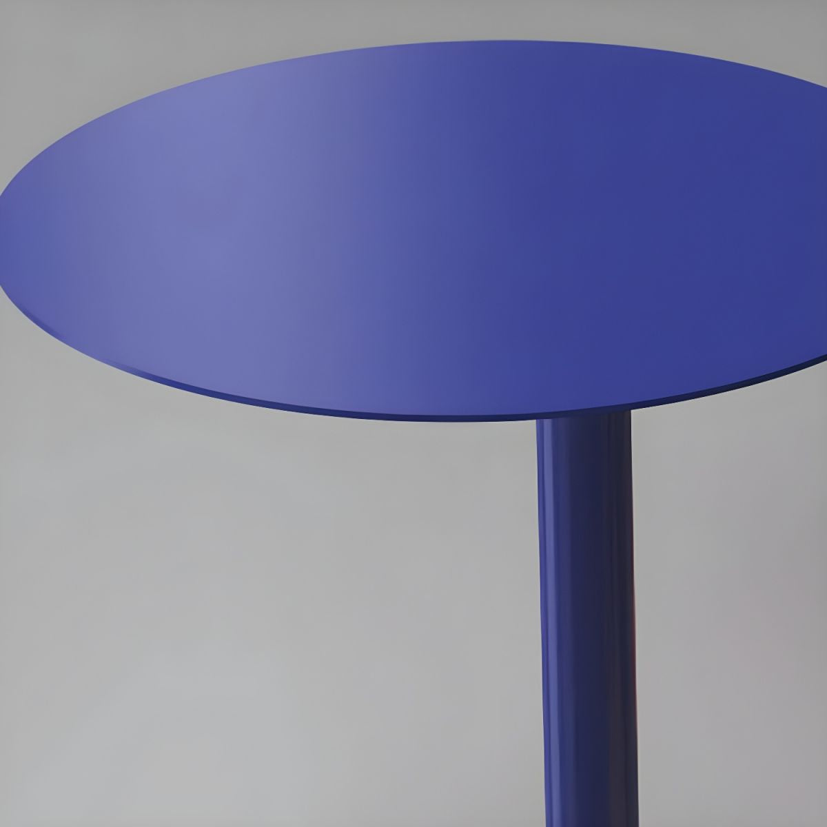 Nordic colorful round metal C-shaped side table with a sleek Scandinavian design
